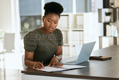 Buy stock photo Black woman, finance paper and accounting worker, laptop and working on budget, planning and strategy in office at desk. Business woman, financial employee and reading contract, document or paperwork