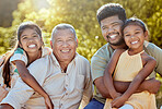 Family, father with grandfather and children outdoor, happy in the park portrait for bonding and quality time together. Men with kids smile out in nature, happiness in the sun and generations of love