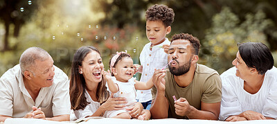 Buy stock photo Happy, smile and big family blowing bubbles in a garden on a summer picnic in Puerto Rico. Happiness, grandparents and parents with children playing, having fun and relaxing together in the park 
