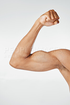 Buy stock photo Fitness, muscle and arm bicep in studio, isolated on white background for exercise, workout and training. Strength, power and strong body of muscular man flexing for bodybuilding, gym and wellness