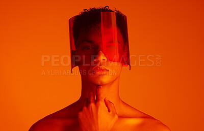 Buy stock photo Cyberpunk, red and portrait of fashion model with glasses, aesthetic neon light and futuristic face mask design for sci fi fantasy. Creative lighting, facial beauty and future black man with focus