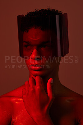 Buy stock photo man, face and red light with futuristic glasses for edgy cyberpunk fashion, modern gen z fantasy and sci fi model for beauty. Young black man, vision thinking or designer neon lighting studio