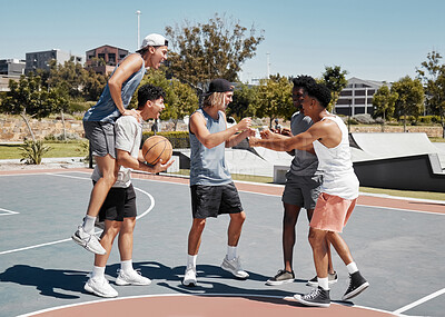 Buy stock photo Basketball player, fist bump and friends celebration for training goal, game achievement or teamwork success at outdoor court in urban city park. Group of people or men celebrate on basketball court