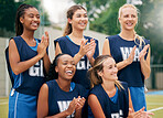 Netball, sports and women team applause, cheers and celebrate game, competition or training outdoor field support, motivation and teamwork. Happy athlete girl group clapping hands for winner goal