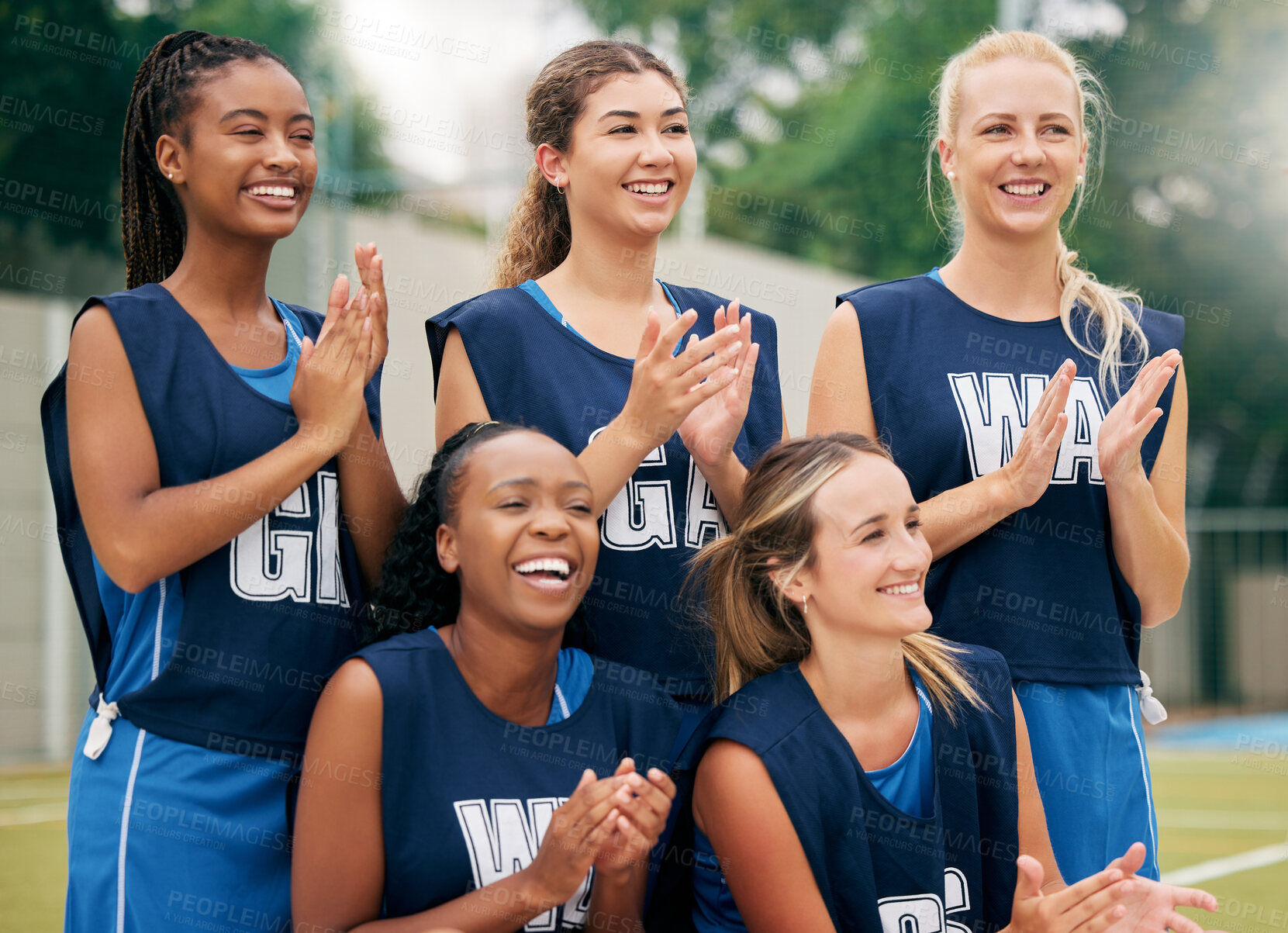 Buy stock photo Netball, sports and women team applause, cheers and celebrate game, competition or training outdoor field support, motivation and teamwork. Happy athlete girl group clapping hands for winner goal