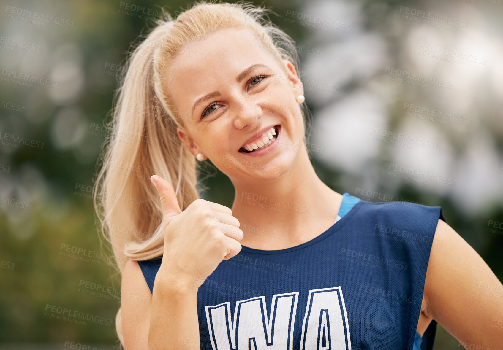 Buy stock photo Thumbs ups, netball and sports woman in portrait for competition success, winning face and outdoor fitness motivation with green park bokeh. Australia athlete girl with like, yes or okay hand sign