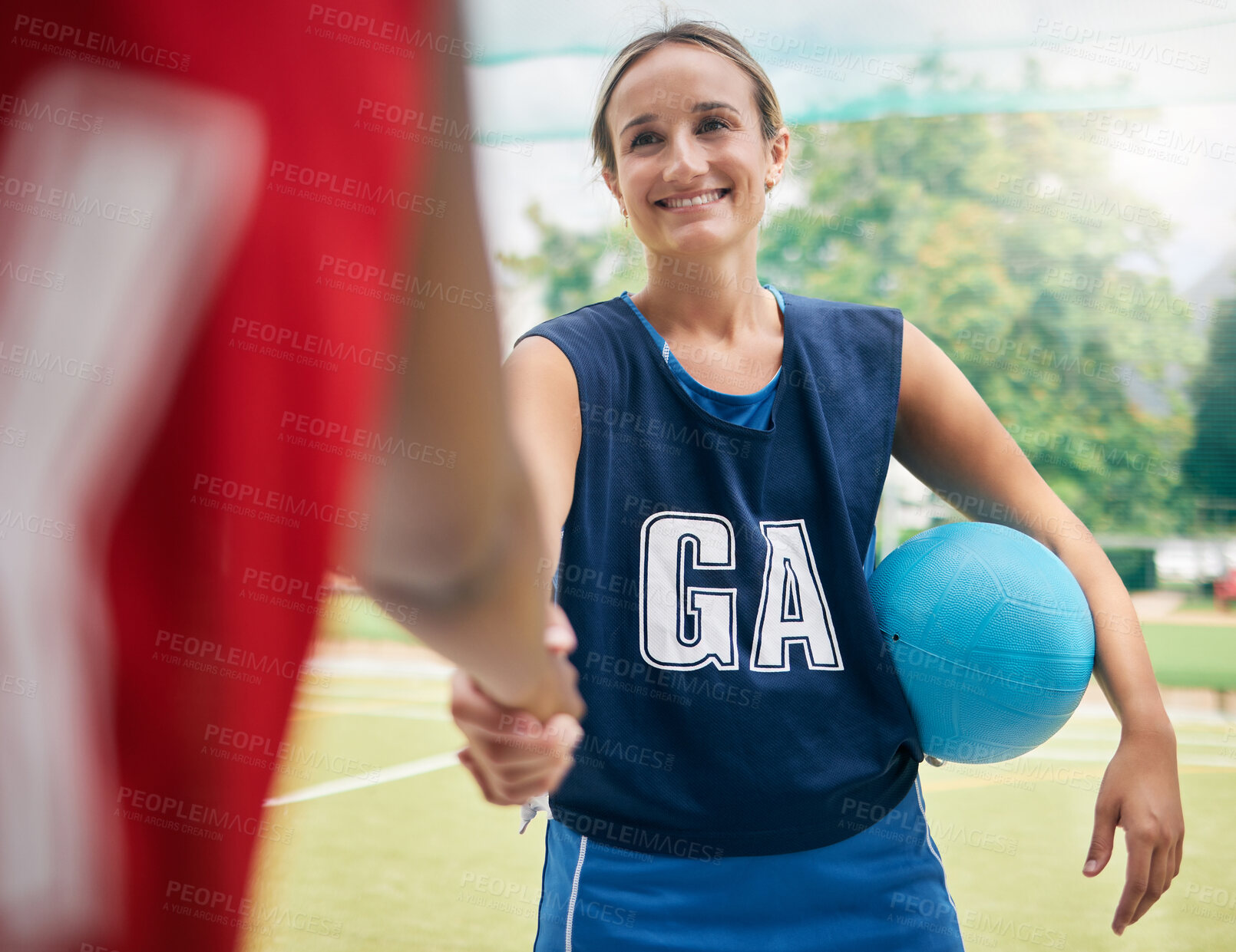 Buy stock photo Handshake, sports and women in netball shaking hands in a training match or game competition outdoors. Smile, respect and happy players greeting on a court in summer before fitness workout exercise