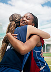 Sports, hug and women friends with teamwork, support and love for game, competition and training success in a park field. Netball, collaboration and team hugging for celebration, winning or thank you
