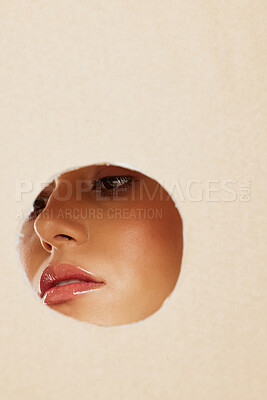 Buy stock photo Aesthetic face, woman with makeup in spotlight circle or zoom on skincare with lipstick in studio mockup. Natural beauty cosmetics to highlight glow, creative art or view paper texture design