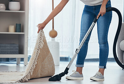 Buy stock photo Woman, cleaning and doing house work with vacuum machine appliance for living room carpet to clean dirt or dust. Feet of female cleaner or housewife doing housekeeping on lounge floor for hygiene