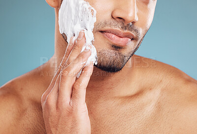 Buy stock photo Shaving cream, skincare and skin grooming of a black man busy with beauty and facial routine. Face health, wellness and cosmetic lotion treatment of a person with beard moisturizer and shave product