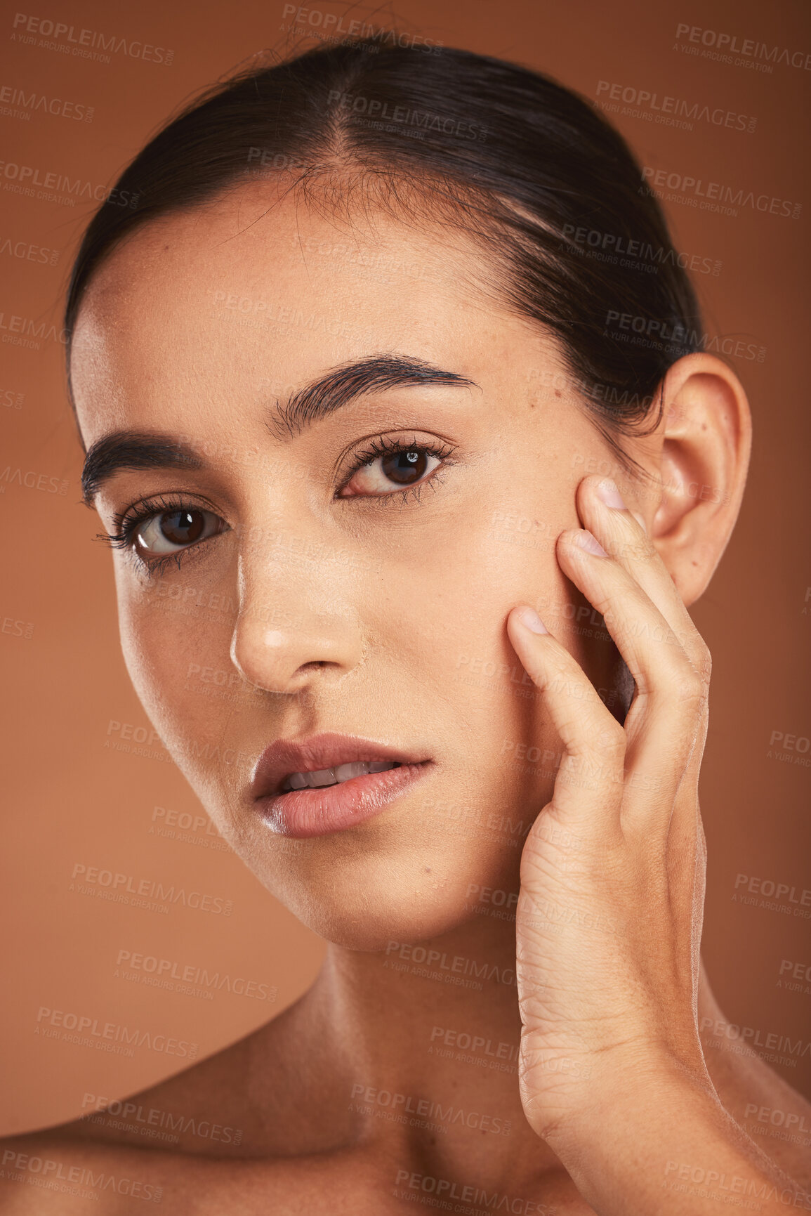 Buy stock photo Skincare, young girl and face with cosmetics, confident and healthy organic facial with brown studio background. Portrait, makeup and girl with pride, natural beauty for smooth skin and wellness.