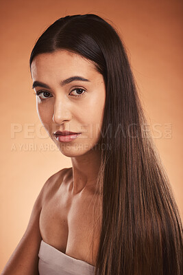 Buy stock photo Hair care, beauty and portrait of woman in studio with clean, healthy and straight hair. Health, wellness and model from Canada with long, beautiful and silky hair style isolated by orange background
