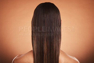 Buy stock photo Brunette woman, shine and hair care, beauty salon, balayage and hair dye, color cosmetics and wig extension on studio orange background. Back of head, scalp and long hair style with smooth texture 