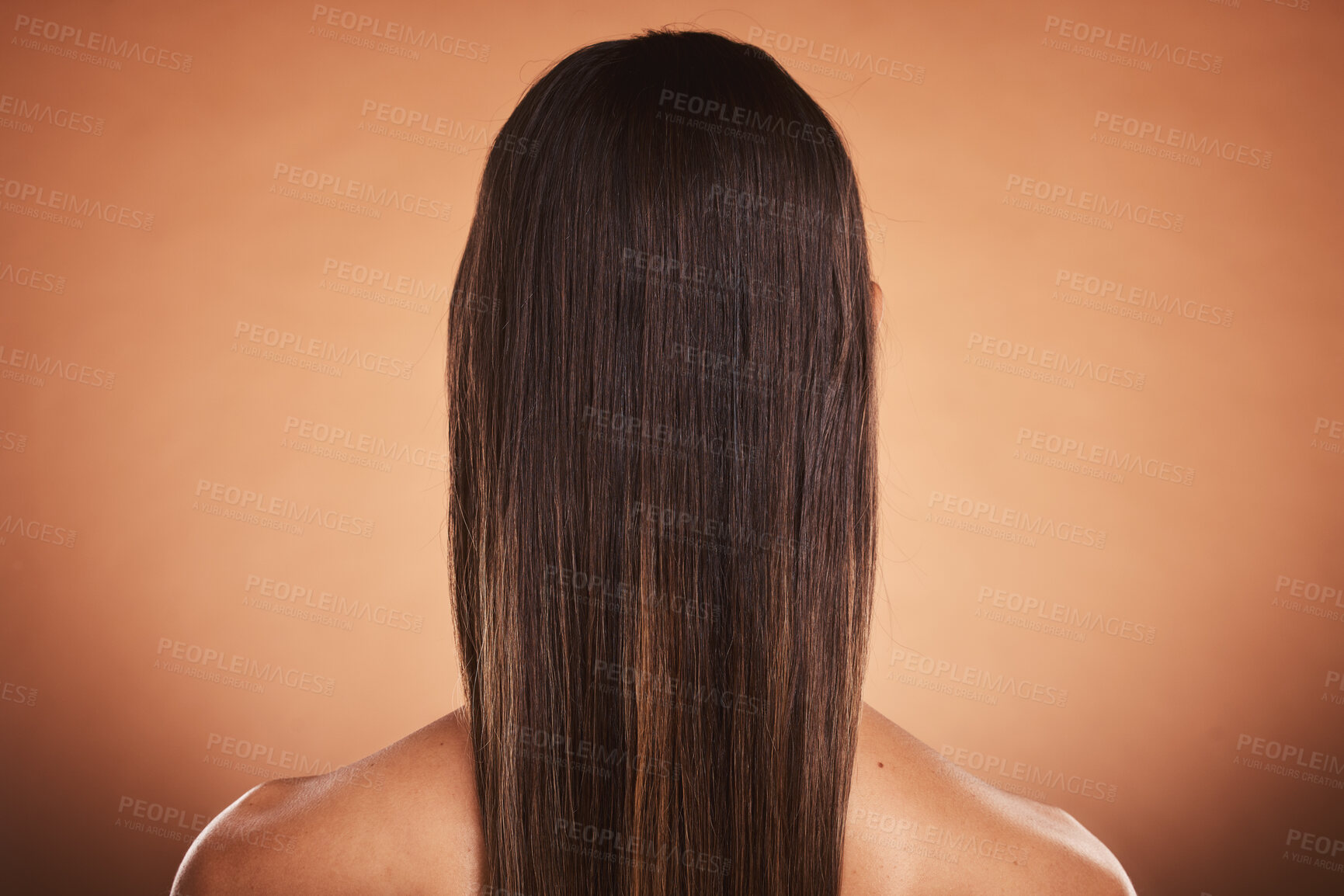 Buy stock photo Brunette woman, shine and hair care, beauty salon, balayage and hair dye, color cosmetics and wig extension on studio orange background. Back of head, scalp and long hair style with smooth texture 