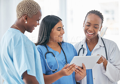 Buy stock photo Doctor, team and tablet in collaboration with smile for research, healthcare or good news at the hospital. Happy medical professionals smiling in teamwork for online communication on touchscreen