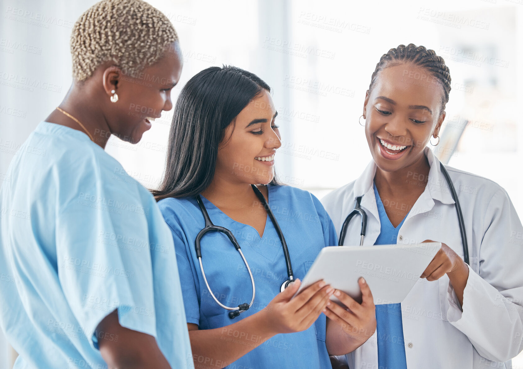 Buy stock photo Doctor, team and tablet in collaboration with smile for research, healthcare or good news at the hospital. Happy medical professionals smiling in teamwork for online communication on touchscreen