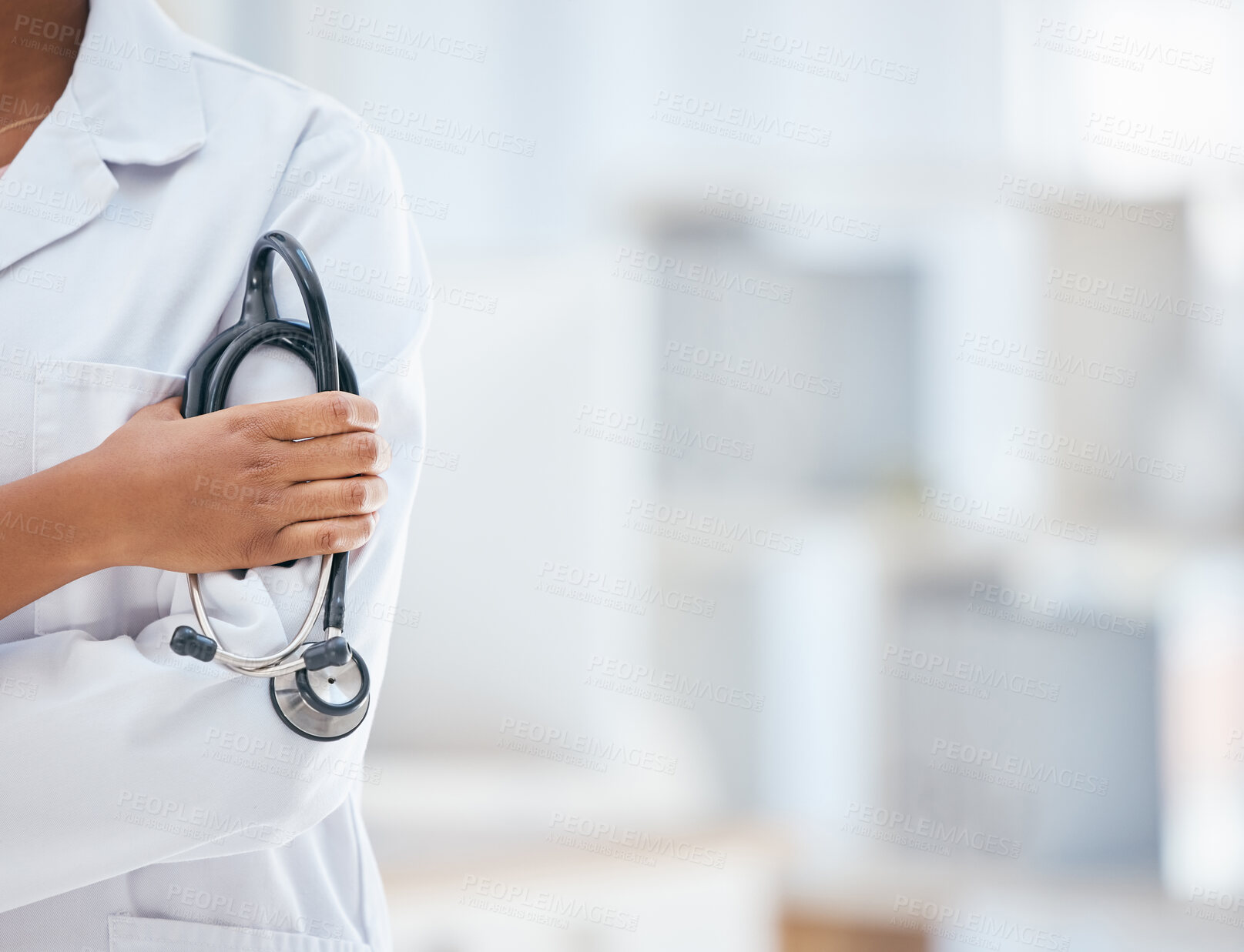 Buy stock photo Doctor hand, stethoscope and hospital employee ready for healthcare and clinic work with mock up. Nurse, health and wellness worker with mockup in a insurance medical cardiology and nursing office