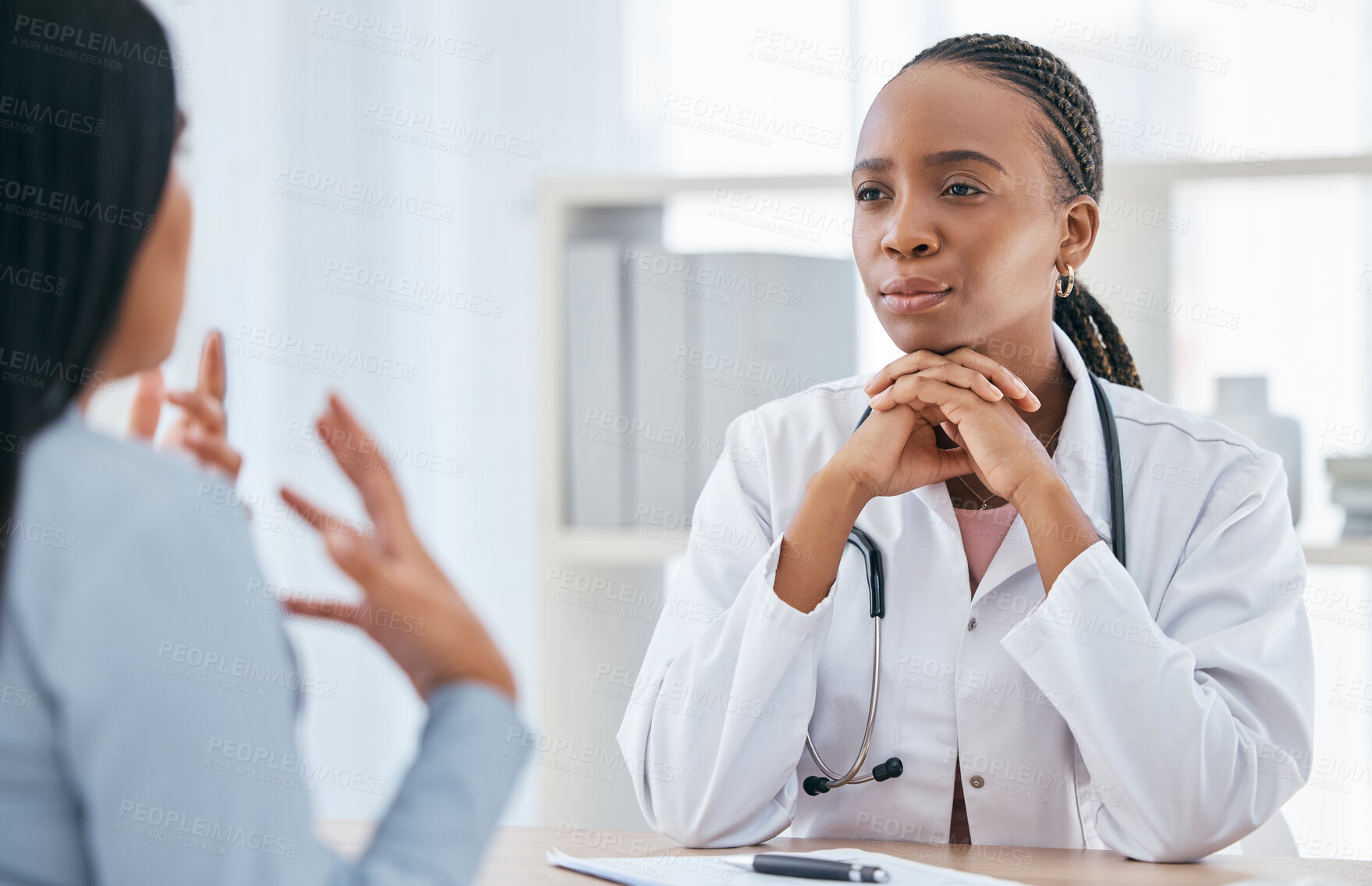 Buy stock photo Doctor, medical and healthcare consultation of a black woman health worker with a patient. Consulting insurance, hospital and cardiology employee busy with medicine consultant help talk in a office