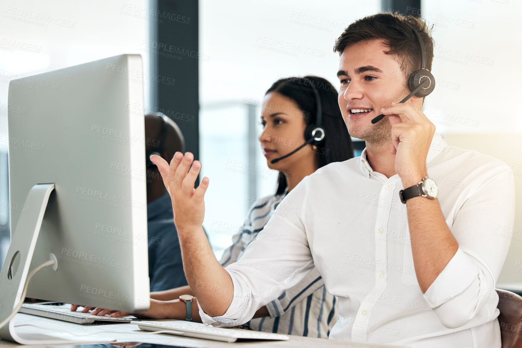 Buy stock photo Computer customer support and crm man employee on an office phone consultation. Speaking internet and web call center employee consultant with headset working on tech consulting and telemarketing
