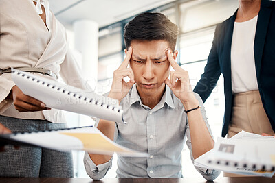 Buy stock photo Businessman, stress and overwhelmed with headache, burnout or workload from colleagues at the office. Corporate man multi tasking suffering from mental health issues, overworked or tired at workplace