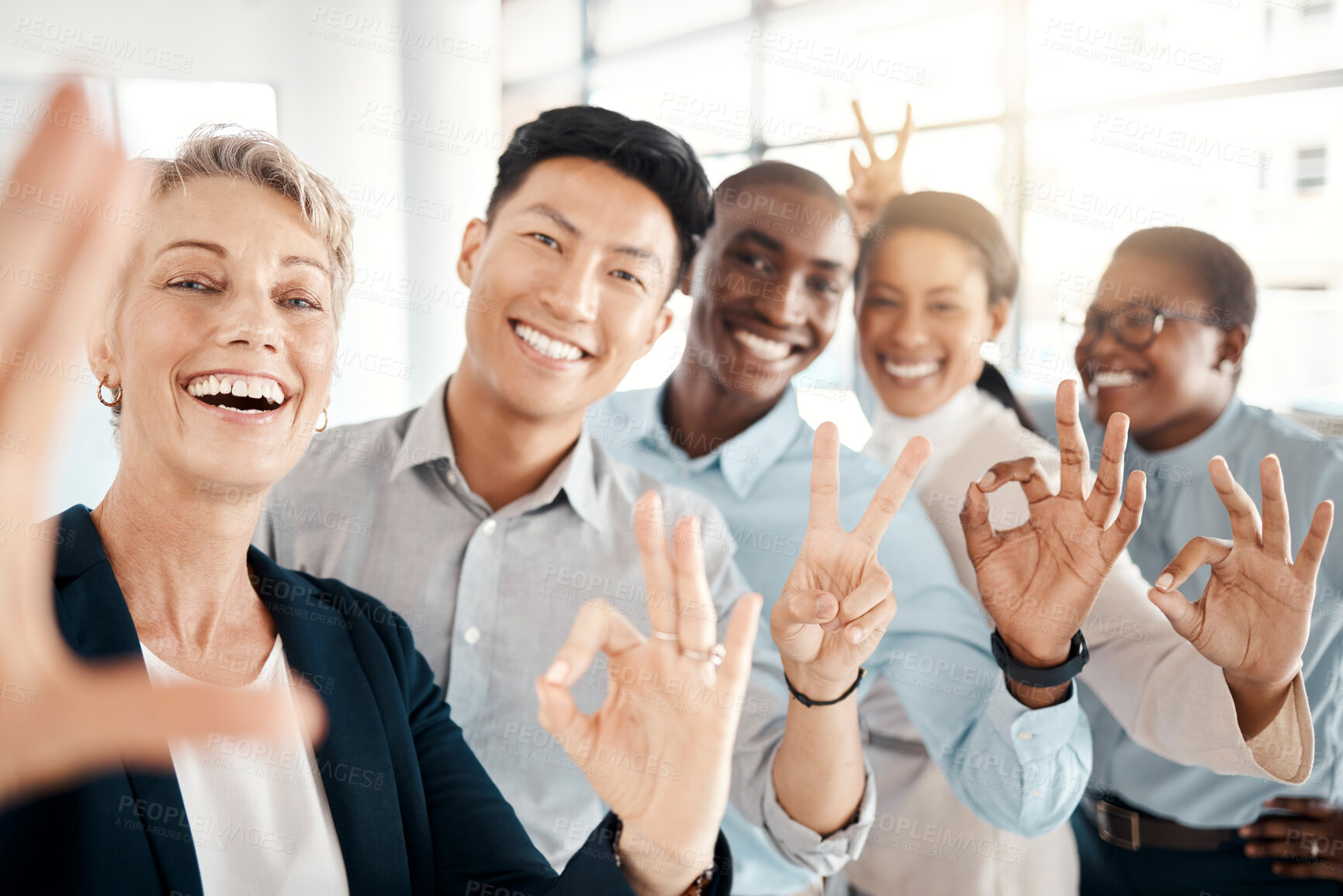Buy stock photo Hand sign, selfie and happy employee group showing diversity, company support and community. Portrait of business people with hands gesture ready for global teamwork collaboration with a smile