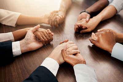 Buy stock photo Support, community and business people praying in a meeting for teamwork, partnership and goal in corporate together. Hands of employees in collaboration, worship and communication at a conference