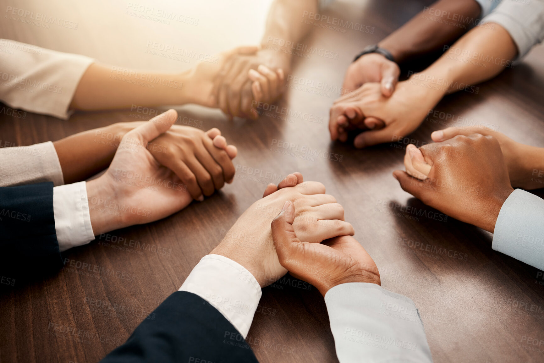 Buy stock photo Support, community and business people praying in a meeting for teamwork, partnership and goal in corporate together. Hands of employees in collaboration, worship and communication at a conference