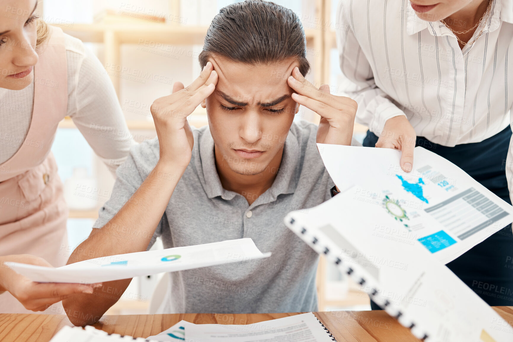 Buy stock photo Stress, headache and overwhelmed worker with burnout handed office paperwork by manager and employees. Mental health, anxiety and tired worker stressed or frustrated with note report review deadline
