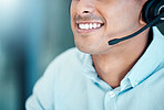 Call center, customer service and mouth of agent in the office, smile and on client call. Communication, telemarketing and cropped face of businessman working in customer support, crm and consulting