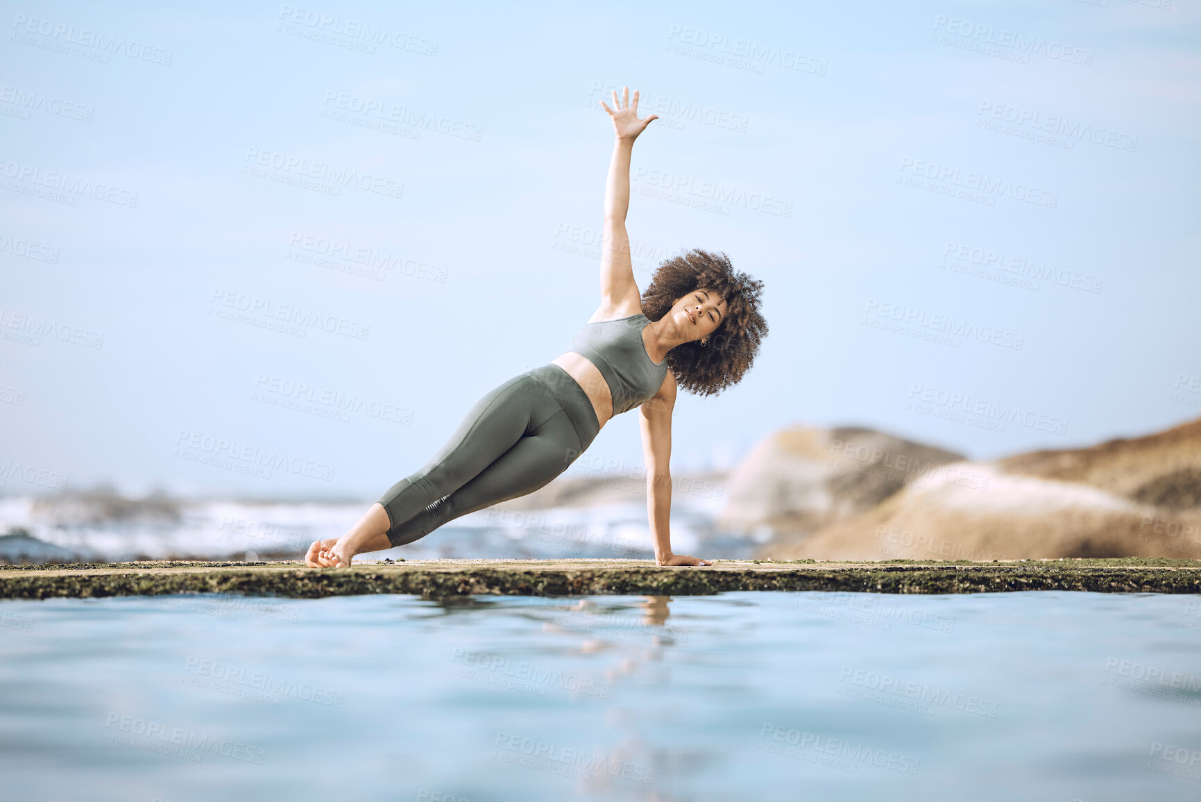 Buy stock photo Yoga, balance and black woman exercise at the beach, fitness outdoor with zen and body training. Mindfulness, workout out in nature and ocean, freedom and health, active life with wellness motivation