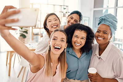 Buy stock photo Office, interracial and women phone selfie with happy smile for diversity, friends and team building. Professional and diverse staff at workplace capture photograph on smartphone for social media.

