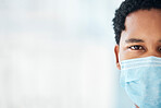 Mockup of black man, face mask and covid 19 healthcare, medical wellness or bacteria safety, global emergency and pandemic risk. Portrait of african guy, corona virus ppe and protection on copy space