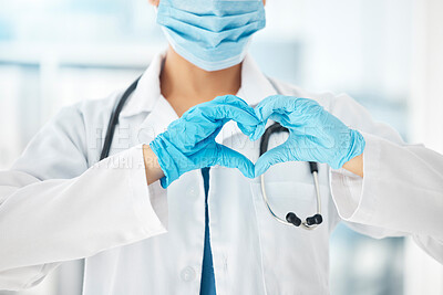 Buy stock photo Doctor, hands and heart gesture in covid healthcare, love or trust for consultation or appointment at the hospital. Hand of medical GP showing hearty sign or emoji with mask during pandemic at clinic
