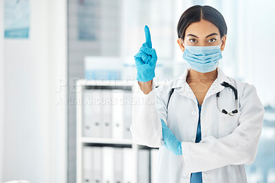 Buy stock photo Woman, pointing doctor and covid face mask in hospital, clinic or wellness pharmacy for global virus stop, compliance or rules. Portrait, healthcare worker or medical employee with advertising space 