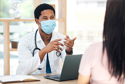 Buy stock photo Covid, laptop and doctor consulting patient for vaccine advice, healthcare corona virus results and check exam report in a hospital office. Covid 19 medical black man expert talking in consultation