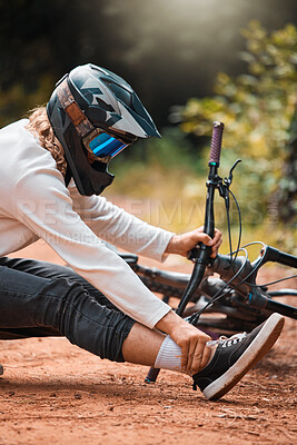 Buy stock photo Ankle pain, cycling and man on the ground in a park with injured foot, pain and accident while riding bike for fitness. Foot pain, bicycle and dirt road accident, cyclist and foot injury in a forest
