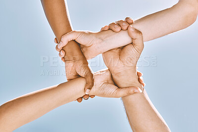 Buy stock photo Wrist hands, teamwork and diversity, support or community, trust or cooperation on blue sky. Collaboration, business people holding arms or motivation for goal, mission or target, unity or solidarity