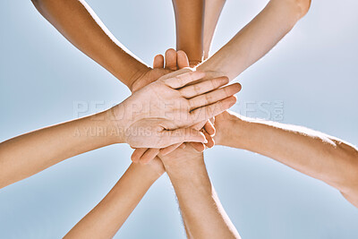 Buy stock photo Below hands stack, group motivation support and trust together outdoor with blue sky. Team hand pile, teamwork vision and solidarity unity friends for community collaboration for people in diversity