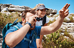 Couple, binocular and hiking in mountain and enjoy view, exercise and fitness in nature while trekking. Freedom, rock and woman with ma, backpack and training for health and wellness outdoor travel