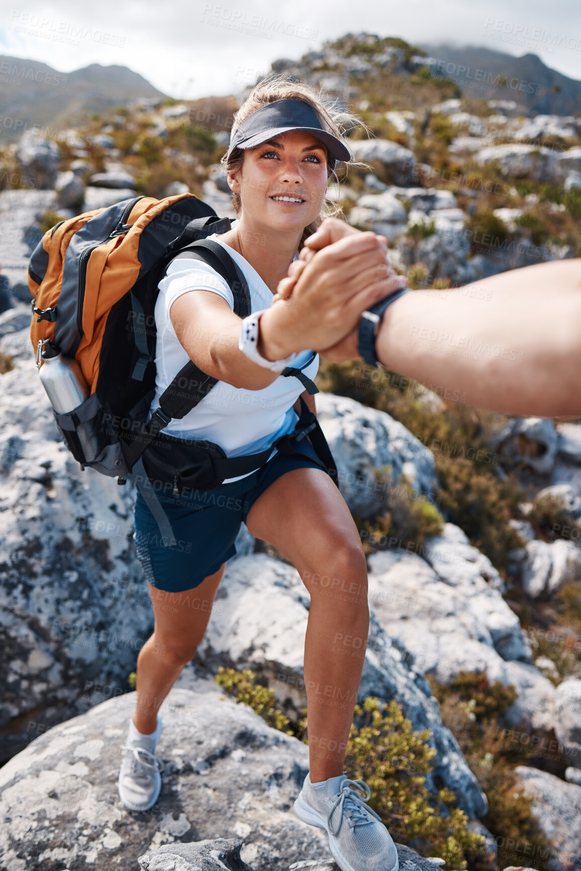 Buy stock photo Woman get help hand on mountain hiking with partner, friends or coach for fitness, health and adventure. Girl hiker, helping hand and support on nature rocks outdoor for wellness, fun and exercise