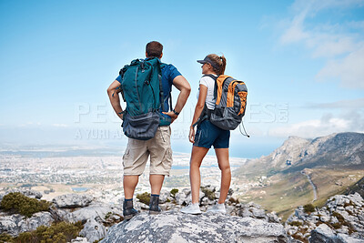 Buy stock photo Hiking, view and couple in nature for fitness, travel and holiday in the mountains. Back of a training, walking and trekking man and woman on a mountain walk for exercise on a vacation
