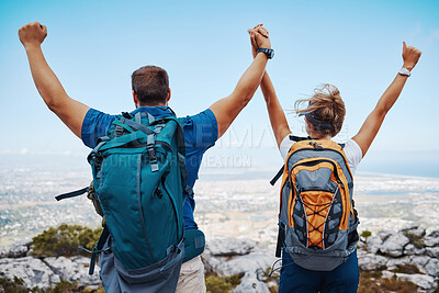 Buy stock photo Success, hiking and couple holding hands on a mountain top in celebration with freedom and support outdoors. Nature, goals and healthy woman enjoys a lovely fitness milestone achievement with partner