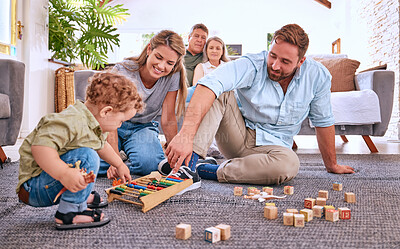 Buy stock photo Parents, learning and child playing with toys for education and development at home. Motor skills, childhood education and little boy playing with abacus with mother and father for bonding and care