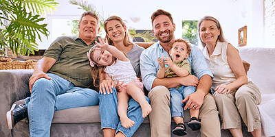 Buy stock photo Happy family with kids, parents and grandparents on sofa with smile in living room. Happiness, family and generations of men, women and children spending time in home together making happy memories.