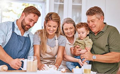 Buy stock photo Grandparents, parents and kid baking, happy and being loving together in kitchen. Family, cooking and smile with happiness, spend quality time and have fun while bonding, make food and meal at home.