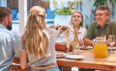 Buy stock photo Family, food and eating people with champagne, lunch and outdoor patio for holiday, celebration or reunion BBQ. Family grandparents with table food, barbecue and wine or alcohol to celebrate together
