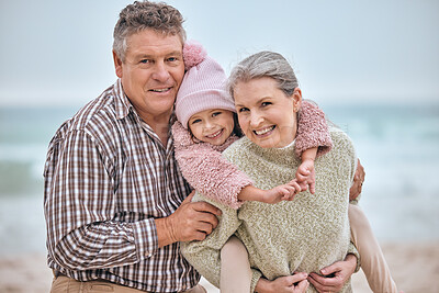 Buy stock photo Grandparents, child and happy family on vacation beach with smile, happiness and support on adventure, travel and time together. Portrait of senior man, woman and girl having fun with piggy back ride
