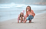 Sisters, beach and happy with smile, on sand and have fun together being playful, joy and cheerful for holidays. Portrait, siblings or girls at ocean for bonding, loving or seaside vacation for break