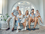 Big family, portrait and generations relax together on couch in living room at home. Happy grandparents, mother smile and father love adorable young children, calm and sitting on lounge sofa bonding